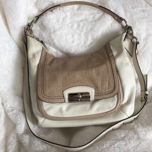 Coach leather handbag, cream and tan color.
